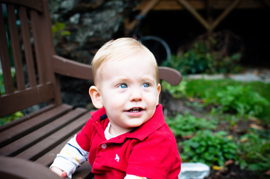 Toddler red polo smiling